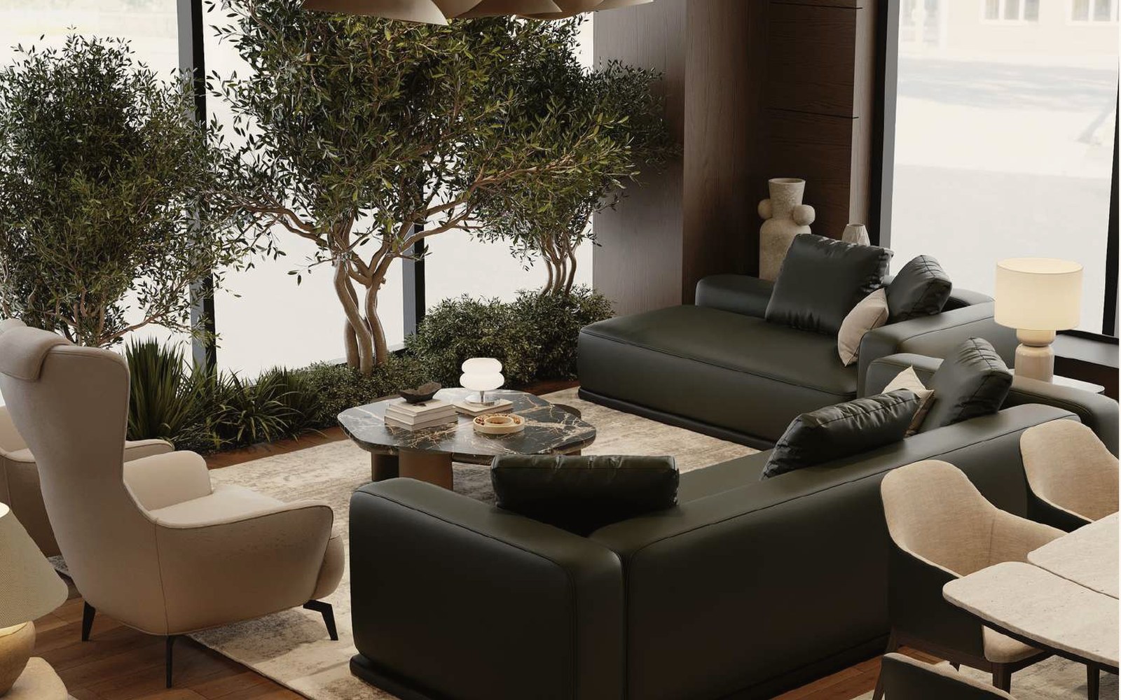 Lounge furniture arranged around a garden courtyard in soft stone